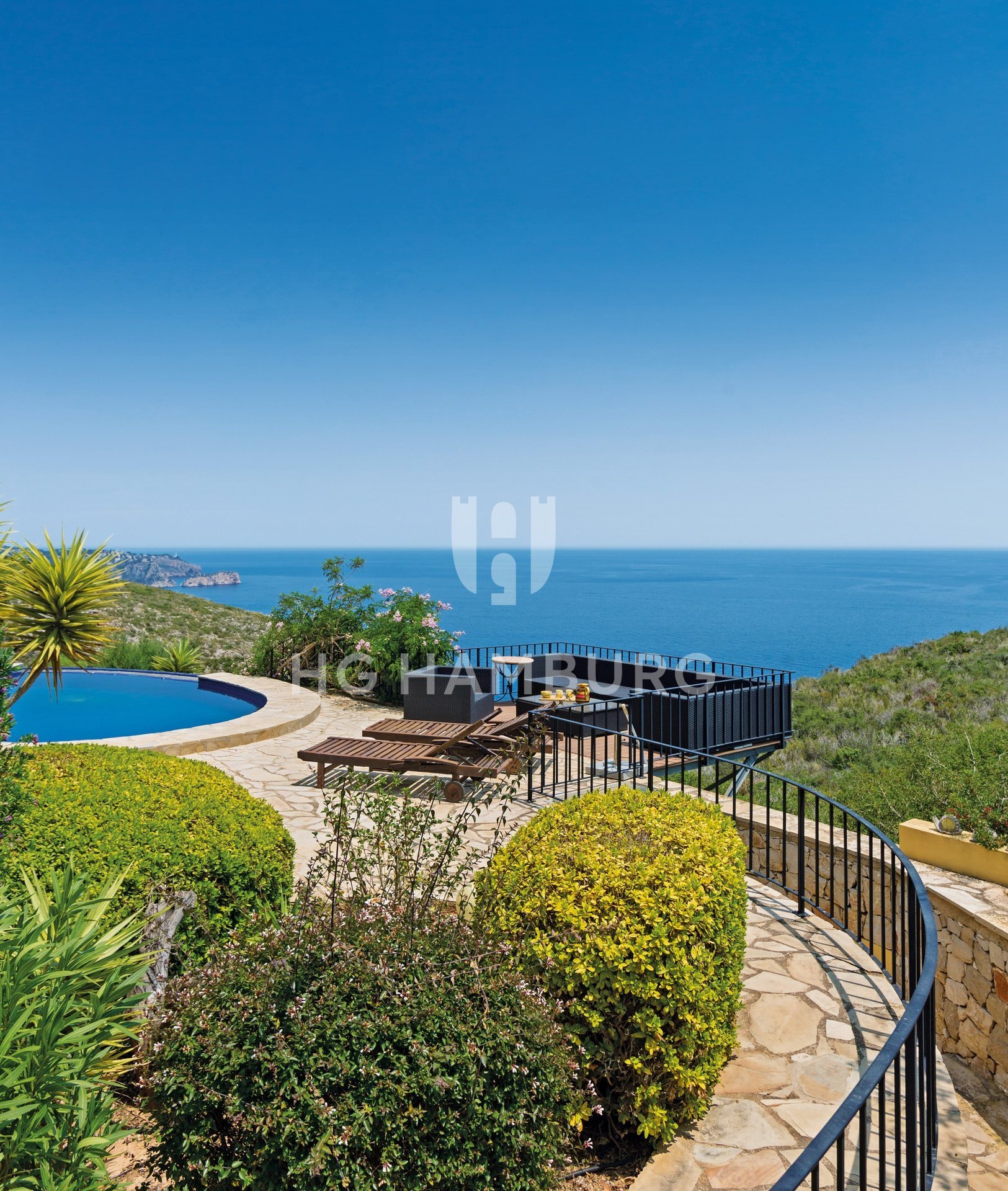 Garden and pool beside the nature park, Benitachell (issue 310)