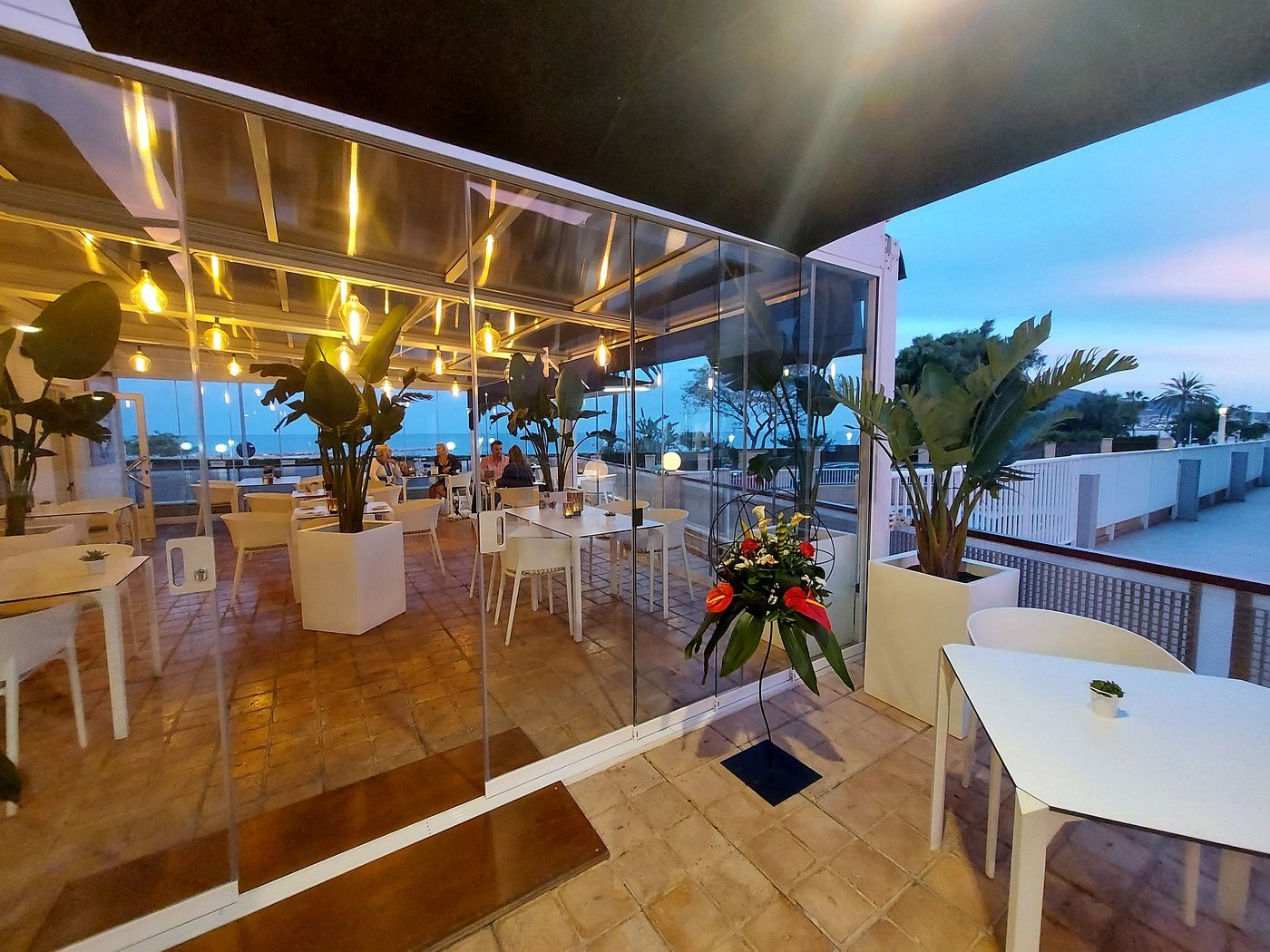 The glazed terrace at sunset